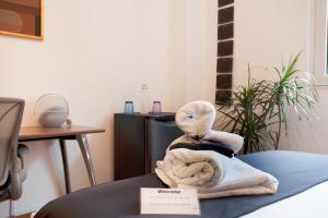 Postel nebo postele na pokoji v ubytování Nomadier Experience Mexico City Condesa + 37 fotografií