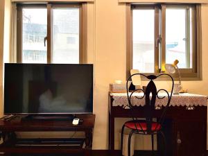 صورة لـ 白紙寓所blank slate B&B-鄰近夜市四人包棟 في ليودونغ