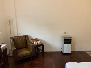 صورة لـ 白紙寓所blank slate B&B-鄰近夜市四人包棟 في ليودونغ
