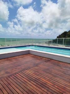 a swimming pool on the roof of a building at Bluesunset in João Pessoa