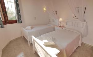Ein Bett oder Betten in einem Zimmer der Unterkunft Villa Yvonne - chill out, free WIFI, close to facilities