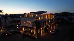 an overhead view of a building with lights at Sea Palm Otel Yalıkavak in Yalıkavak