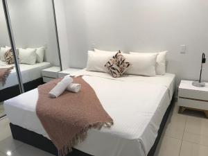 Magnum Serviced Apartmentsにあるベッド