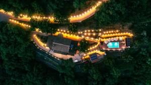an overhead view of a house with lights on it at Villa Lara in Tortorici