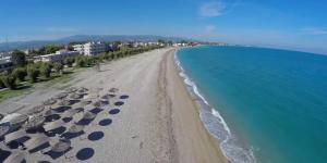 an aerial view of a beach with rocks and the ocean at Lion house Vrachati in Vrachati