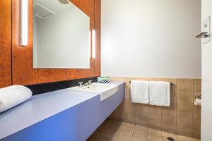 Koupelna v ubytování Burvale Hotel