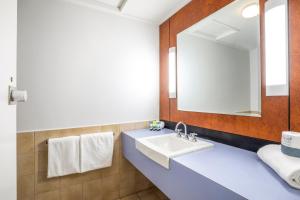 Koupelna v ubytování Burvale Hotel