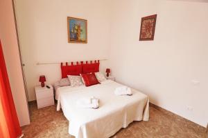 Postel nebo postele na pokoji v ubytování L'ARTE DI VENERE SUITE