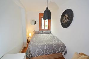 Postel nebo postele na pokoji v ubytování Precioso apartamento de playa en Sanxenxo + 4 fotografie