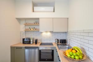 Kuchyň nebo kuchyňský kout v ubytování Dandelion apartments
