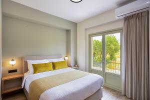 מיטה או מיטות בחדר ב-Dandelion apartments