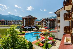 an aerial view of a resort with a swimming pool at Belvedere Holiday Club in Bansko
