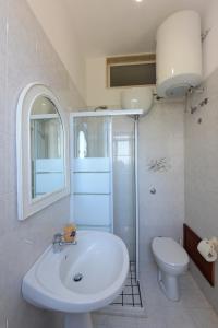 Um banheiro em Villetta Terme di Torre Canne