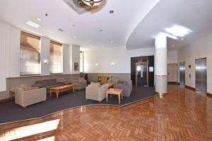 Η κουζίνα ή μικρή κουζίνα στο One-Bedroom Cozy Apartment in Perth CBD