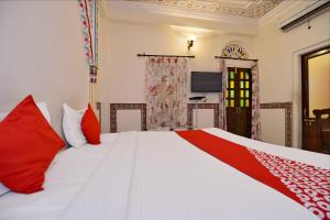 Posteľ alebo postele v izbe v ubytovaní Hotel Tordi Haveli