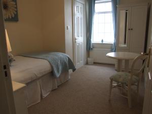 Postel nebo postele na pokoji v ubytování Oak Lodge Portumna