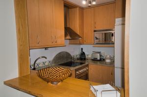 Kuchyňa alebo kuchynka v ubytovaní Apartamento turístico en Sanxenxo