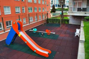 Detský kútik v ubytovaní Apartamento turístico en Sanxenxo