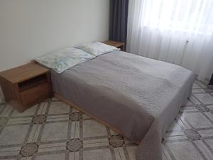 Apartament RELAXにあるベッド