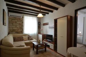 TV a/nebo společenská místnost v ubytování Apartment ALESSIA