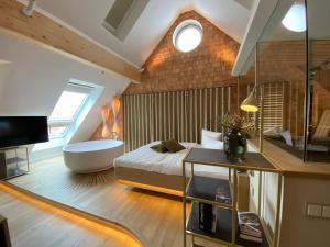 TV a/nebo společenská místnost v ubytování Fleesensee Resort & Spa