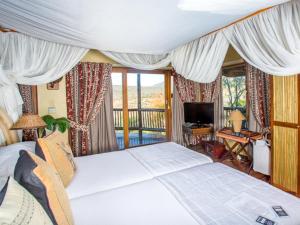 Säng eller sängar i ett rum på Mkuze Falls Private Game Reserve