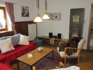 Ein Sitzbereich in der Unterkunft Ferienhaus am Waginger See