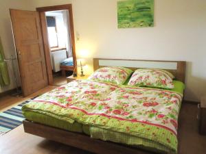Ein Bett oder Betten in einem Zimmer der Unterkunft Ferienhaus am Waginger See
