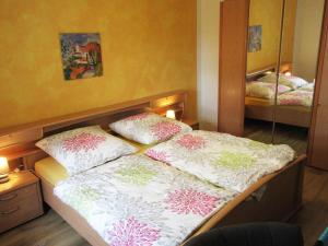 Ein Bett oder Betten in einem Zimmer der Unterkunft Ferienhaus am Waginger See