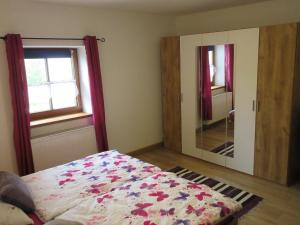 Ein Bett oder Betten in einem Zimmer der Unterkunft Ferienhaus am Waginger See