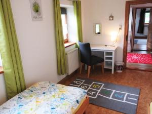 Ein Bett oder Betten in einem Zimmer der Unterkunft Ferienhaus am Waginger See