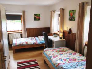 Ein Bett oder Betten in einem Zimmer der Unterkunft Ferienhaus am Waginger See