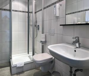 Koupelna v ubytování Hotel Kühler Krug + 29 fotografií