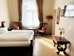 Postel nebo postele na pokoji v ubytování Hotel Kühler Krug