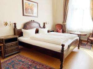 Postel nebo postele na pokoji v ubytování Hotel Kühler Krug