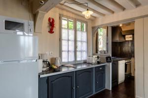 Køkken eller tekøkken på Le Jardin d'Eugene - 4P House - Terrace - Historic Center + 20 billeder