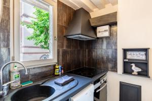 Køkken eller tekøkken på Le Jardin d'Eugene - 4P House - Terrace - Historic Center