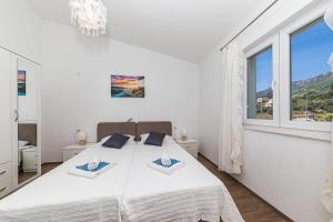 Posteľ alebo postele v izbe v ubytovaní Villa Dišpet + 37 fotografií