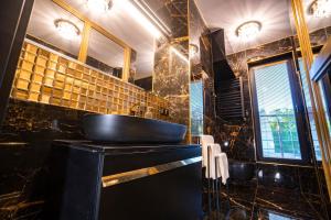 Kúpeľňa v ubytovaní Golden Apartments Centrum
