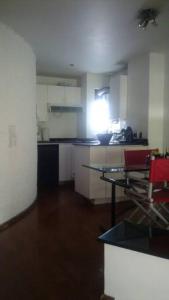 Una cocina o zona de cocina en Personal Suite