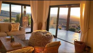 Prostor za sedenje u objektu Tierkloof Mountain Cottages