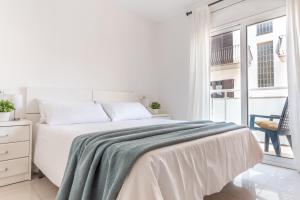Postel nebo postele na pokoji v ubytování Apartamento Retromar