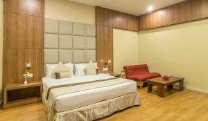 The Citi Residenci Hotel - Durgapur客房内的一张或多张床位