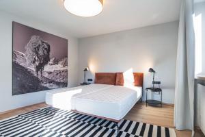 Ένα ή περισσότερα κρεβάτια σε δωμάτιο στο Mami Fee Familien Ferienhaus Hopfgarten