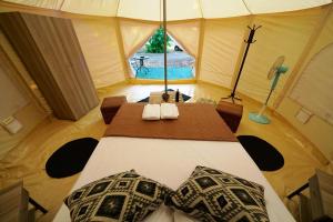 Postel nebo postele na pokoji v ubytování Paliouri Luxury Bungalows