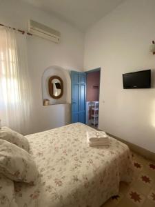 Postel nebo postele na pokoji v ubytování Tranvía Beach House