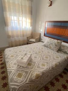 Postel nebo postele na pokoji v ubytování Tranvía Beach House