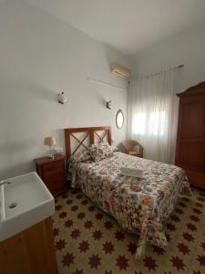 Postel nebo postele na pokoji v ubytování Tranvía Beach House