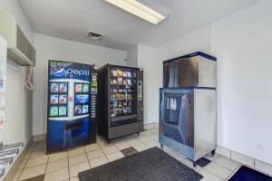 two soda machines in a room next to each other at Motel 6-Norfolk, VA in Norfolk