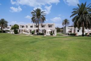Um jardim em Radisson Blu Hotel & Resort, Al Ain